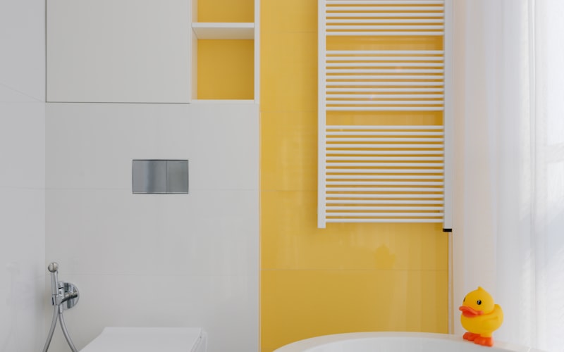 Clean white toilet in a bright bathroom after successful repair