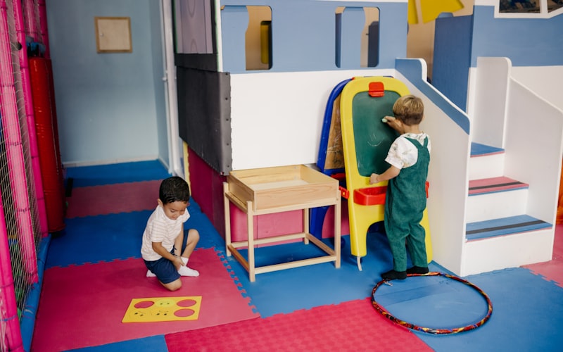 Family-friendly clean home with toys organized and cleaning supplies