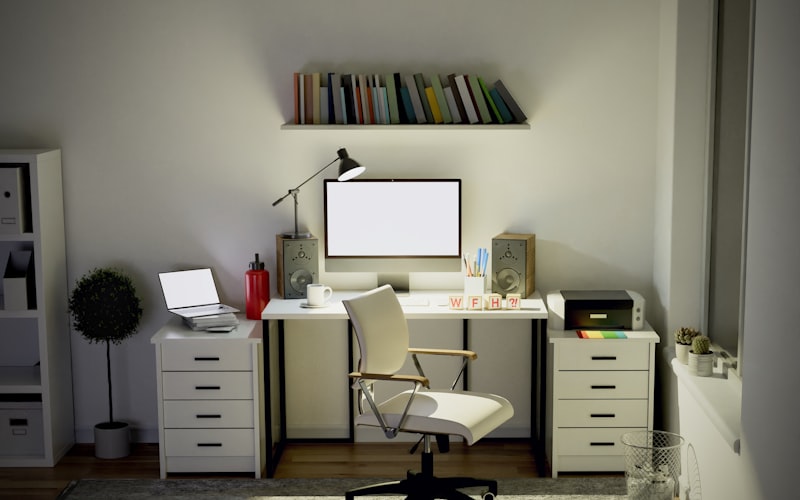 Laptop open with cloud storage showing organized digital document folders