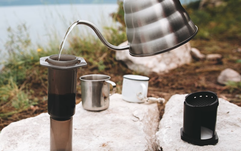 Flat illustration of coffee beans being poured from a bulk bag into a storage container, with a price comparison tag showing savings