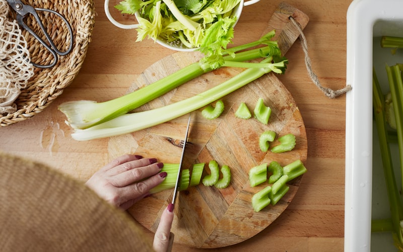 Flat illustration of a smartphone showing restaurant deal notifications with percentage-off badges and coupon icons