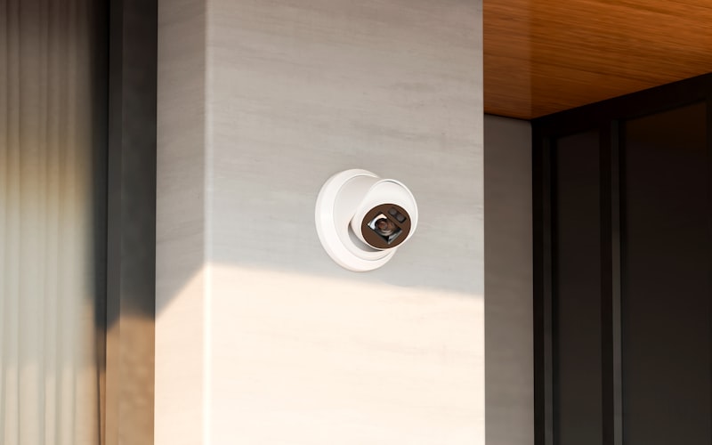 Smart home security panel mounted on wall near front door